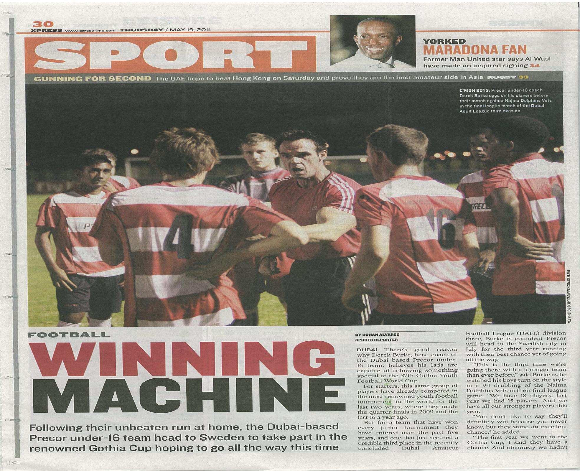 Team celebrating with trophy